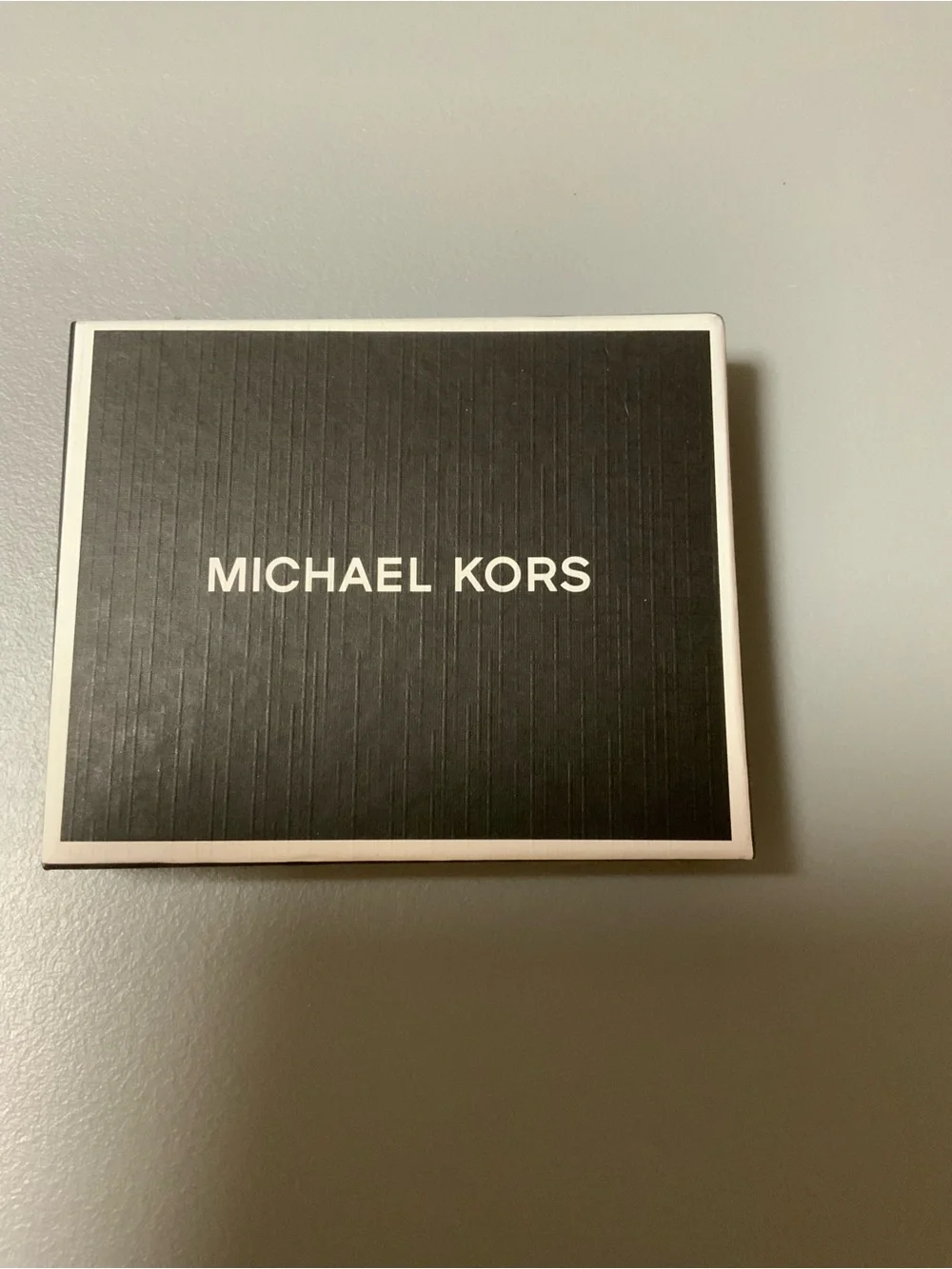Michael Kors Black Slim Bifold Card Holder with Gold Logo